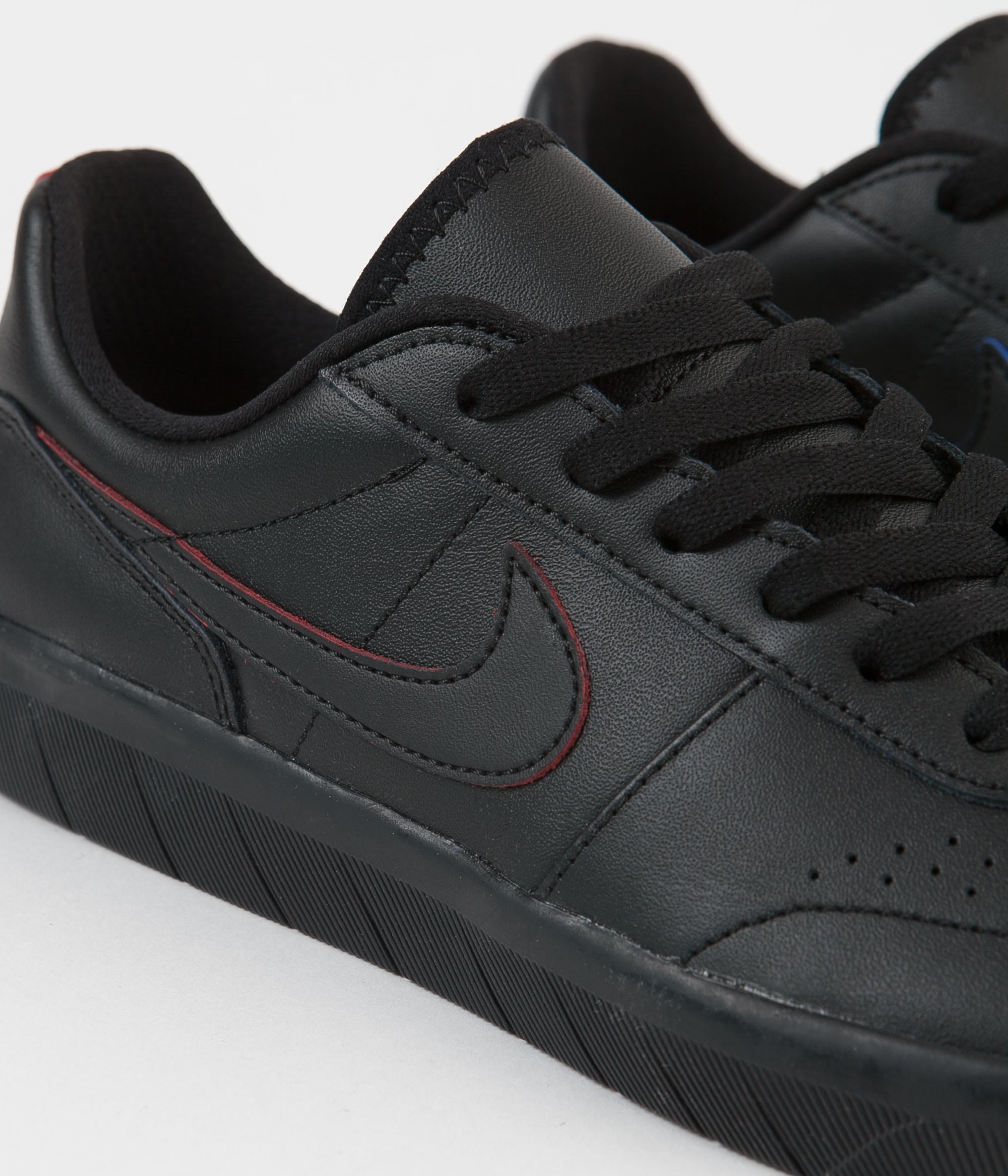 classic black nike shoes