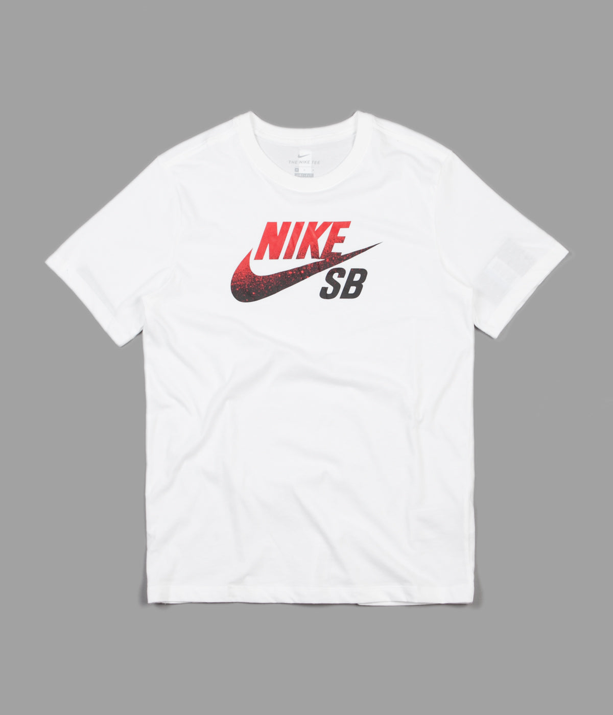 white nike shirt with red logo