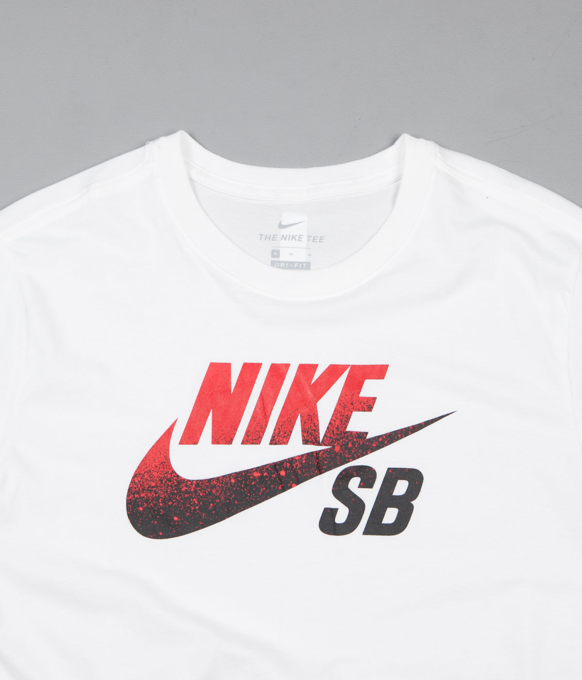 white shirt with red nike logo