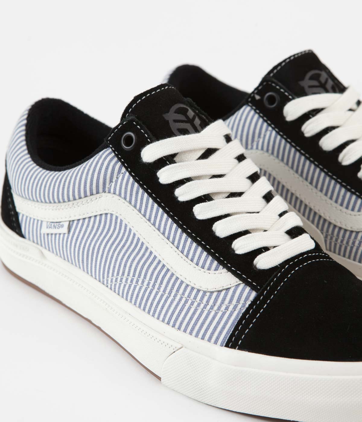 black and blue vans shoes