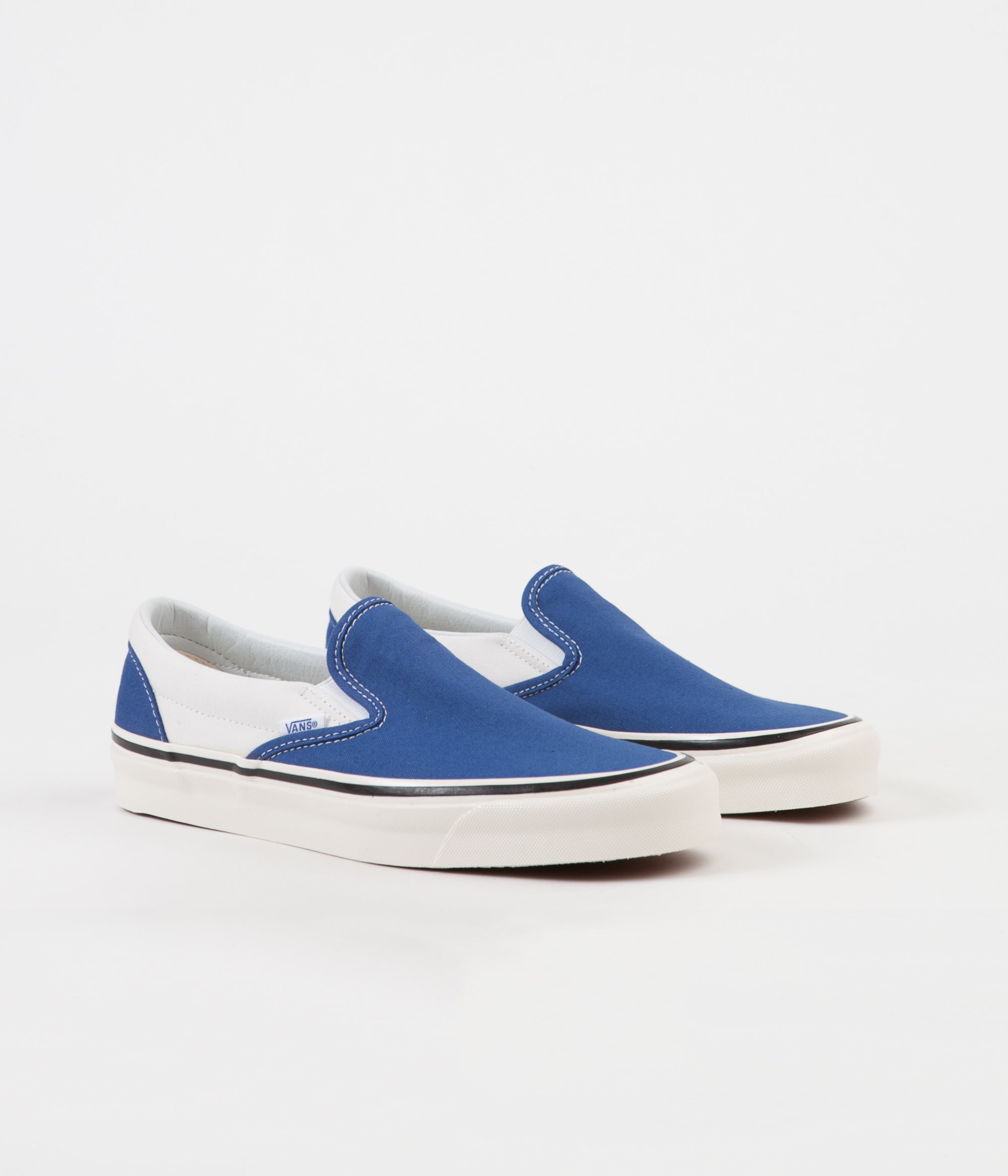 vans slip on blue and white