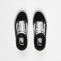 black vans with white stitching