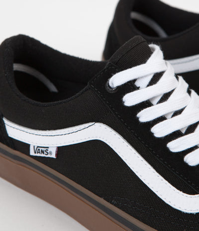 vans black white medium gum