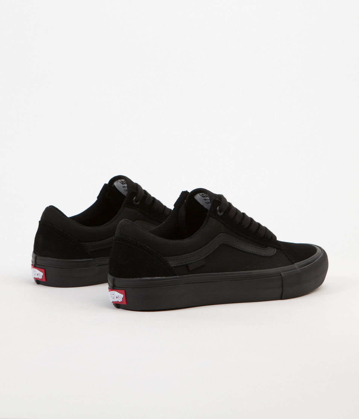 vans slip on total black