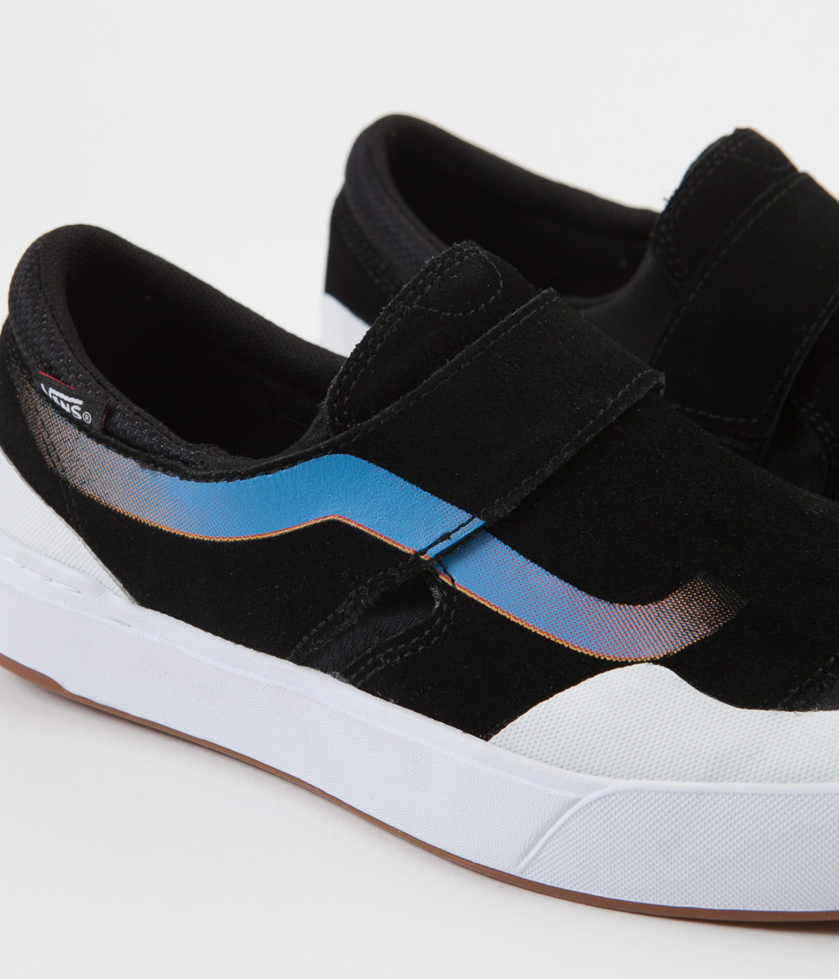 vans black pro slip on