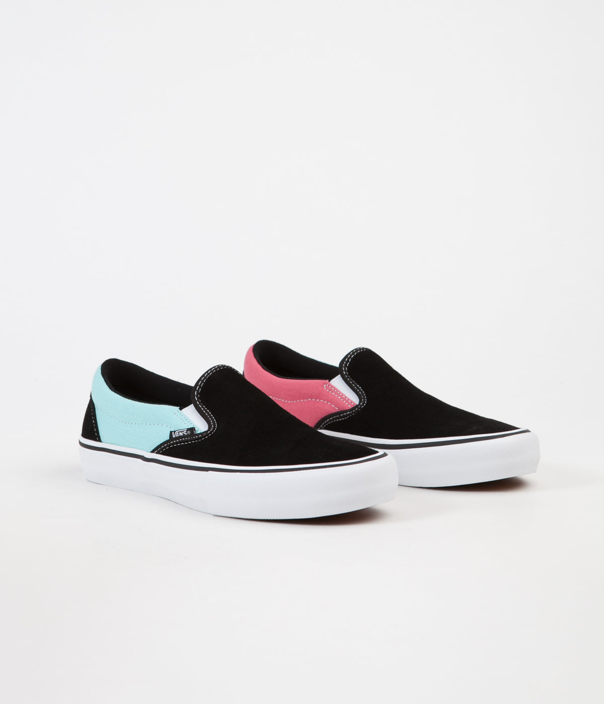 blue and pink vans slip ons