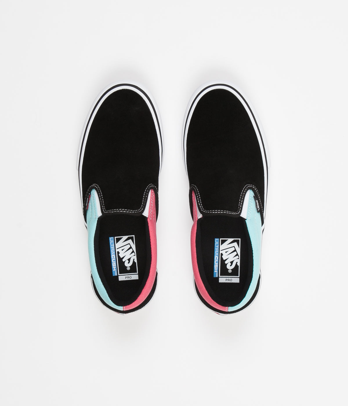 blue and pink slip on vans