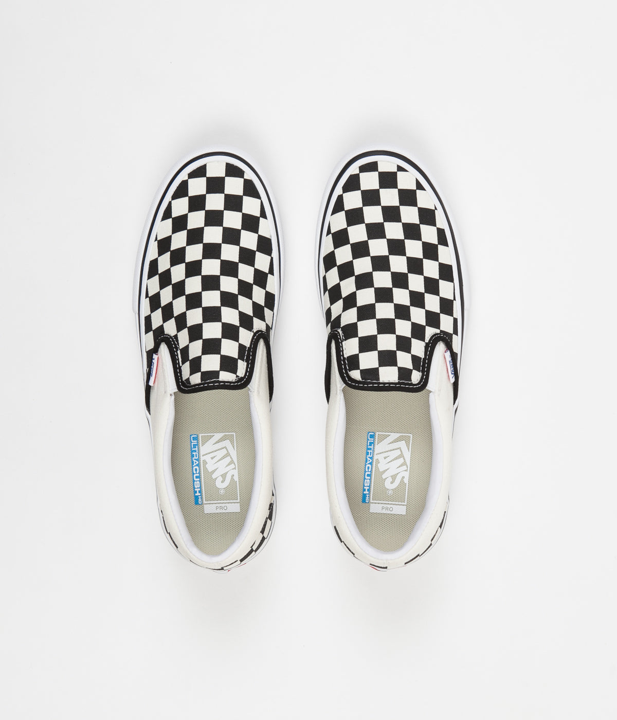 vans slip on pro black white