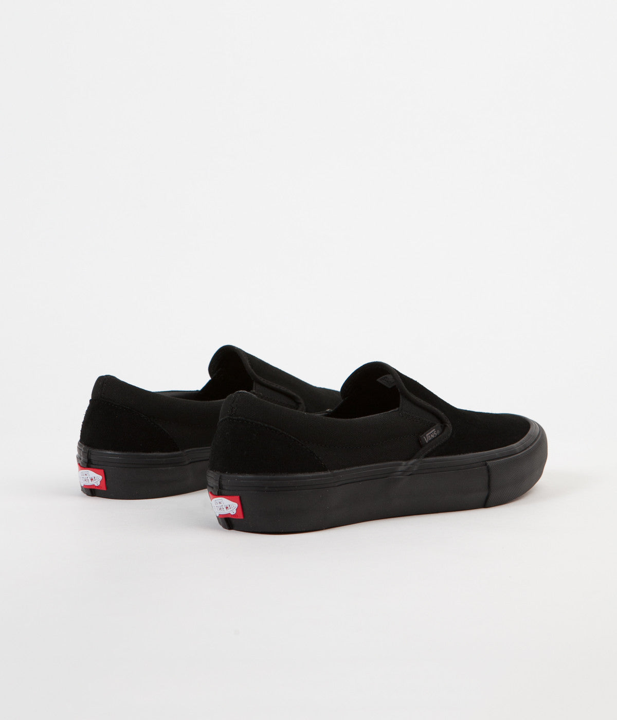 vans triple black slip on