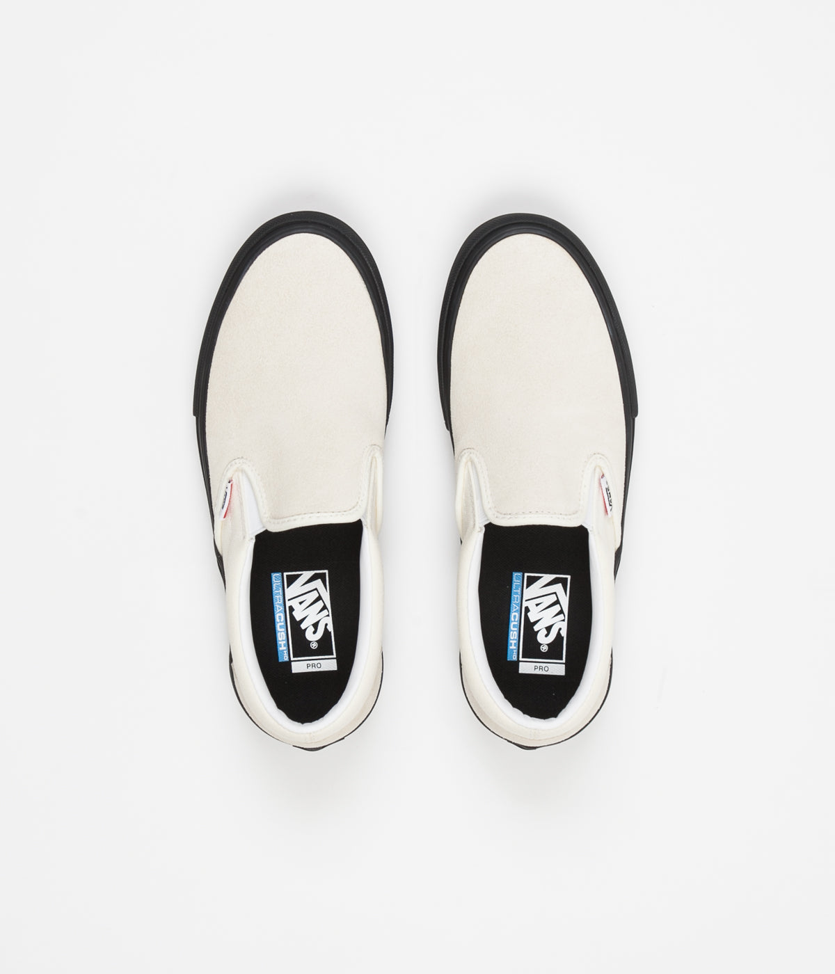 black and white vans slip on pro