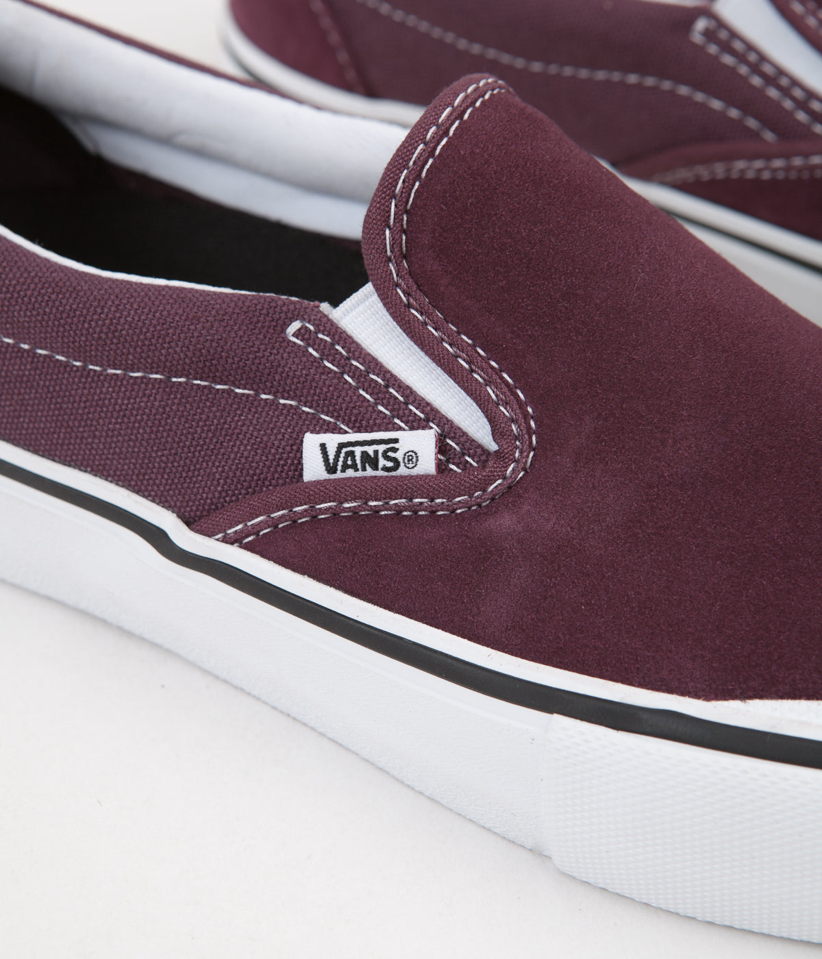 vans slip on pro raisin