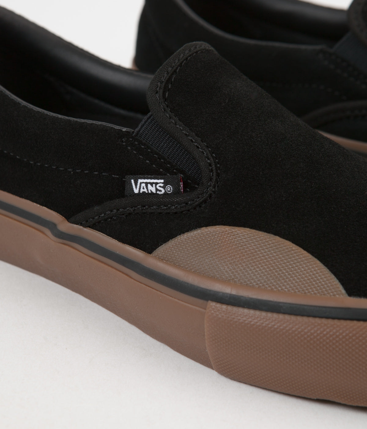 vans slip on black and brown