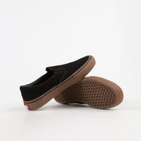 black gum slip on vans