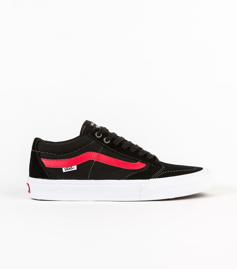 black vans with red stripe