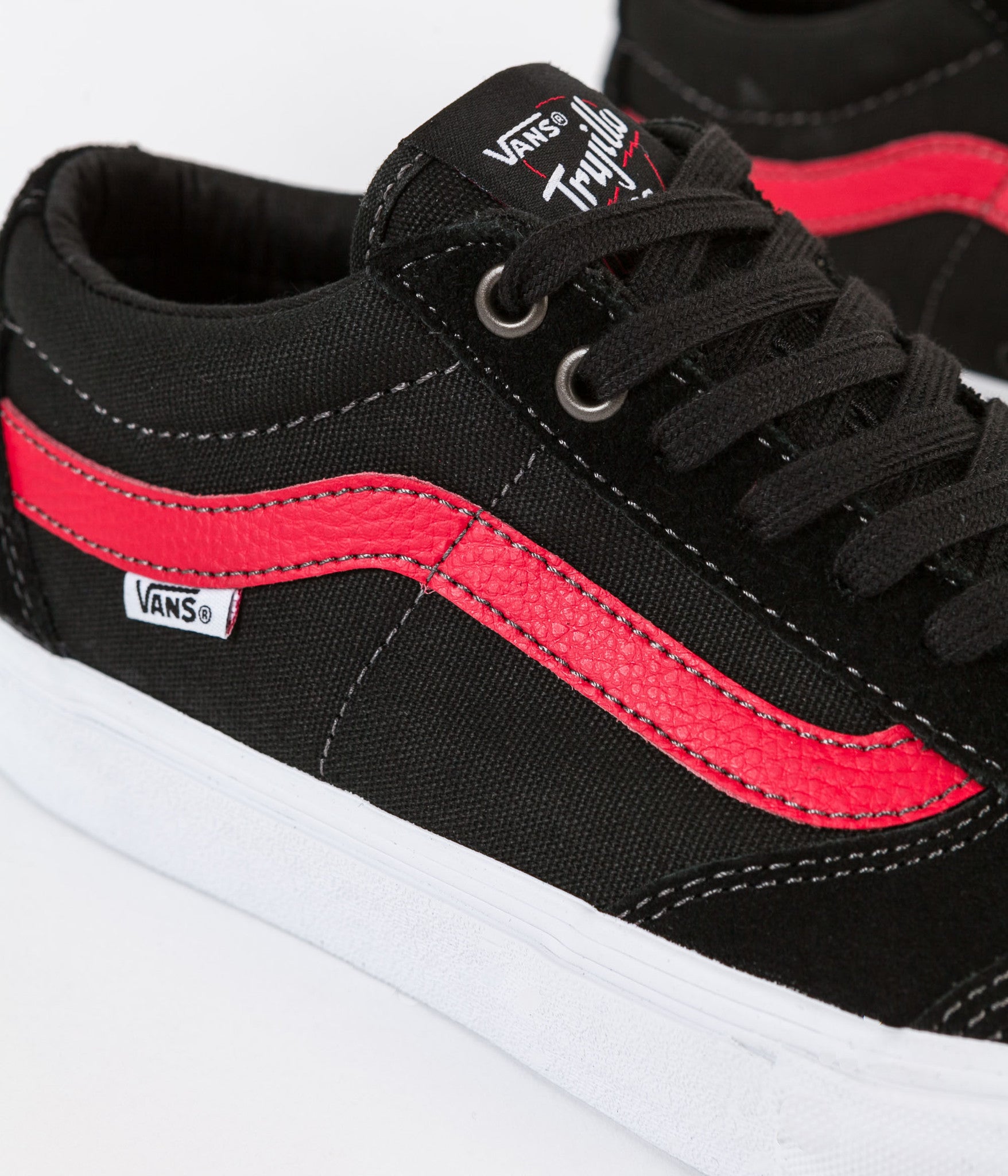 black vans with red