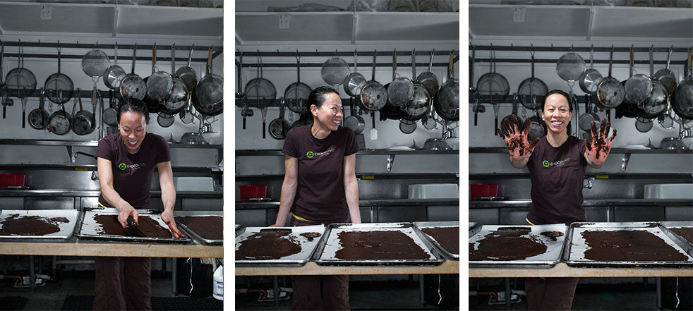 Patricia Tsai happily creating bean to bar chocolate in kitchen of Culver City Chocolate factory and cafe