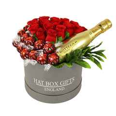 Große Hutschachtel mit roten Rosen, Prosecco & Lindor Pralinen