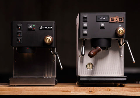 comparison of rancilio silvia with walnut finish heartwood edition in moody lighting