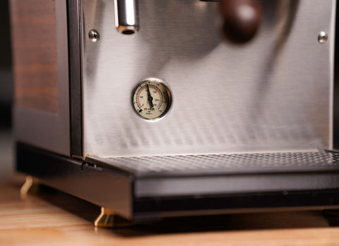 close up of pressure gauge on heartwood edition espresso machine