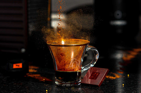 A cup of espresso being brewed 
