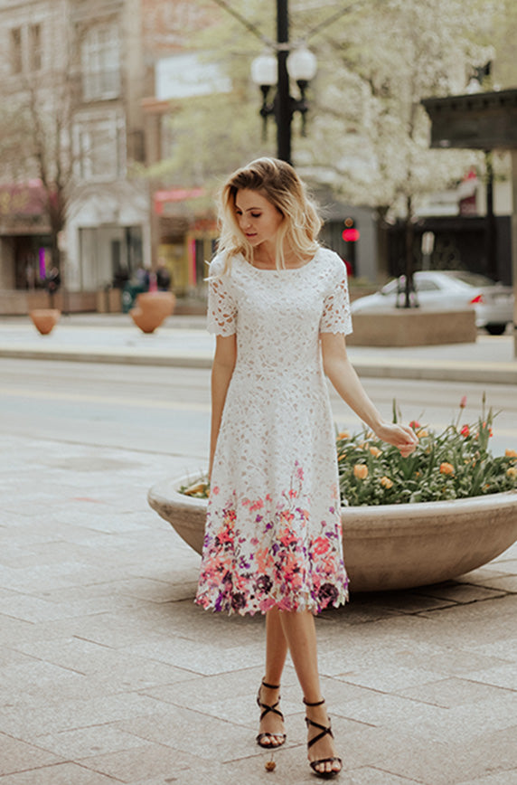 white dress with flowers on it