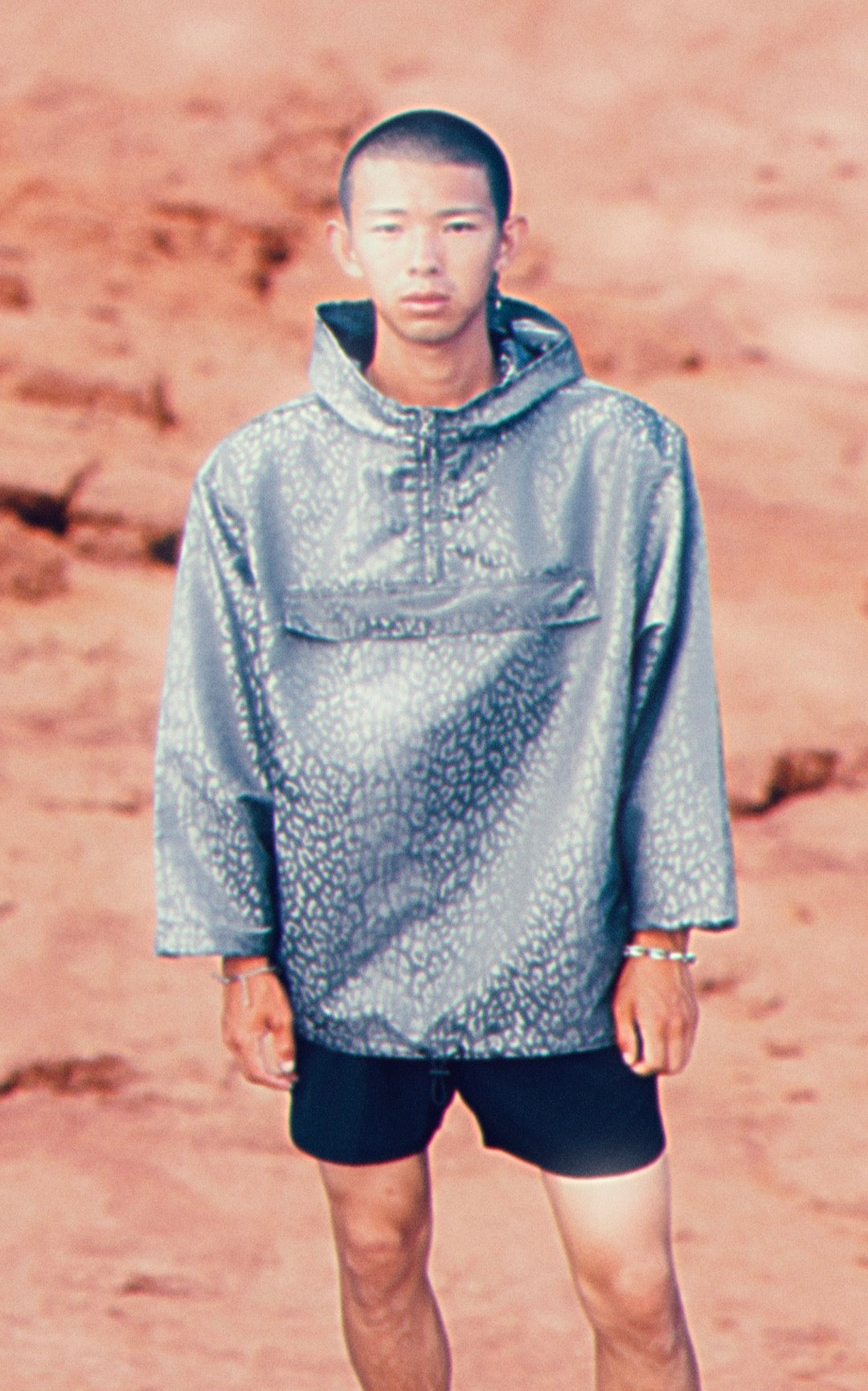 TRUE TRIBE’s Leopard Space Poncho Jacket and Siros Black Work Out Shorts