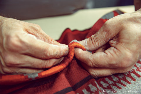 Hand stitching Kantha Work