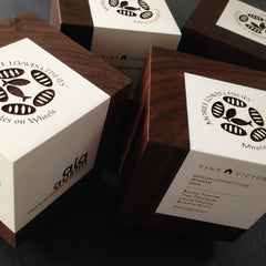 Geometric Walnut Wood and White Paint Engraved Cube Award for Mobile Loaves & Fishes, AIA Austin