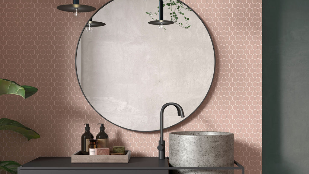 Candy Pale Rose hexagon tile used as a backsplash in a modern bathroom.