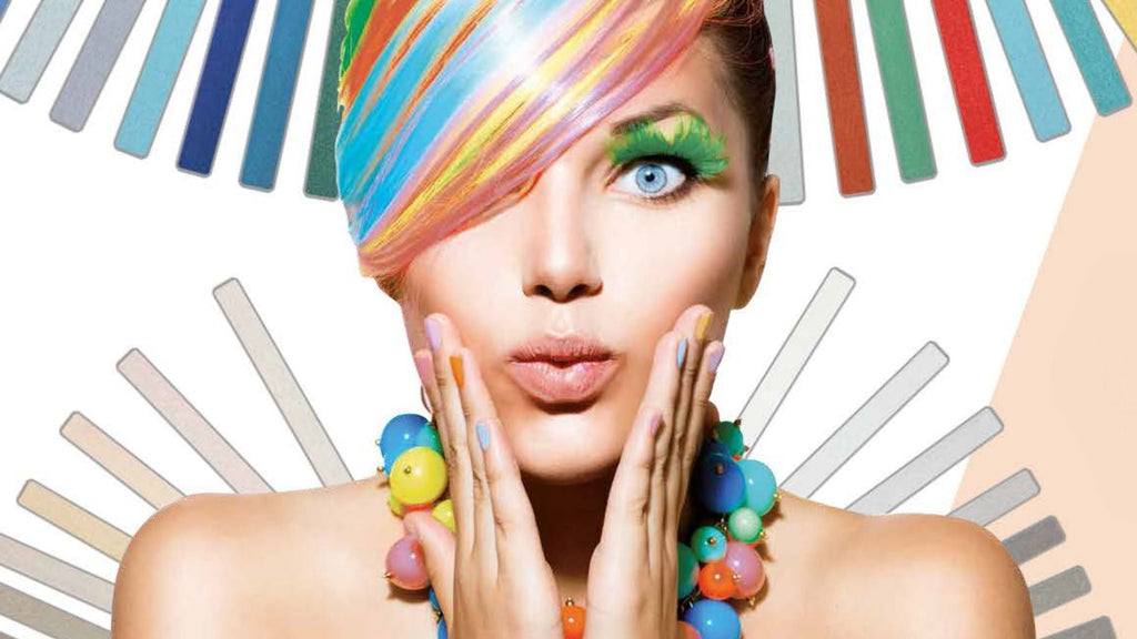 Girl with colorful hair in front of a background of grout channel sticks showcasing different colors.