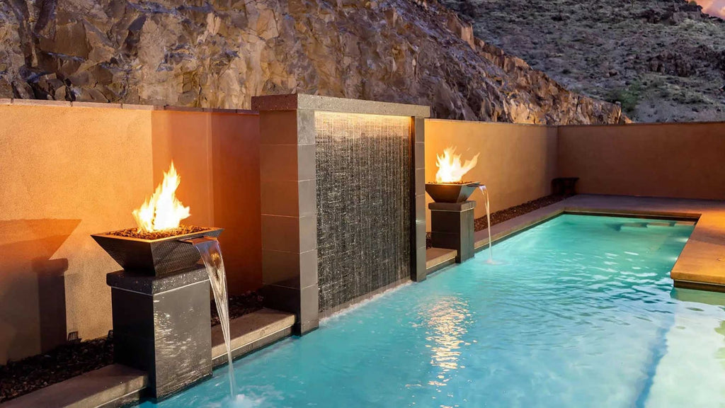 Fire and Water combination bowl running into a pool with a waterfall accent wall