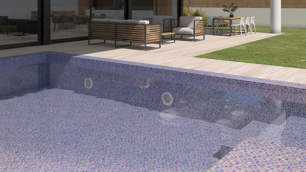 Dark blue, iridescent tile from the Fusion Collection installed in an all glass tile pool.