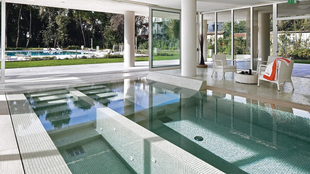 SICIS small-format white glass tile used in an all tile pool.