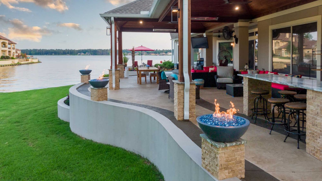 Fire Bowls surrounding outdoor dining space and outdoor living/lounging area