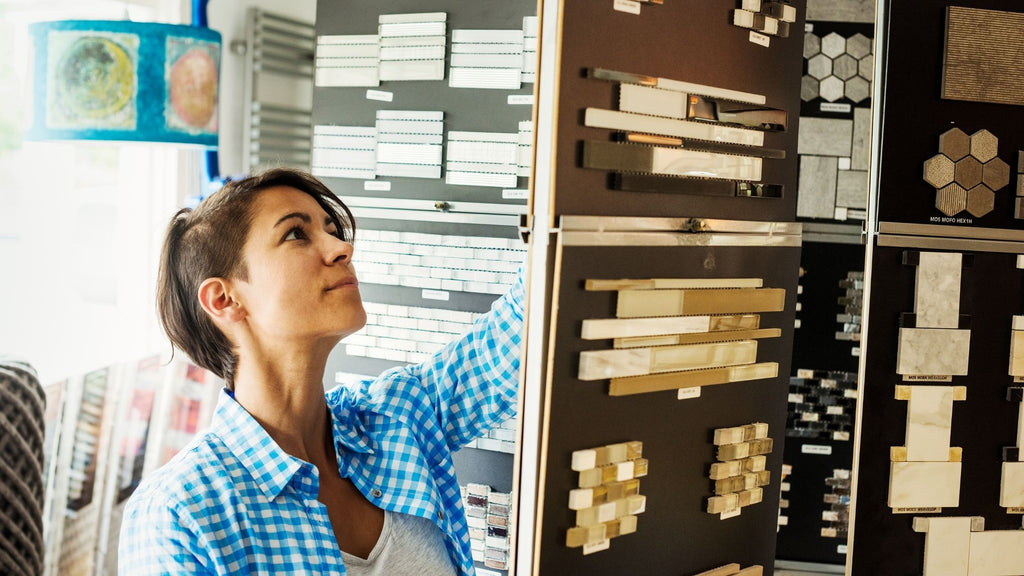 Woman Looking at Tile Samples