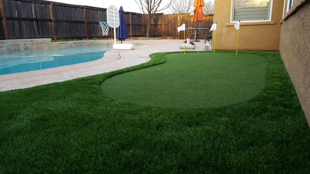 Artificial turf by pool