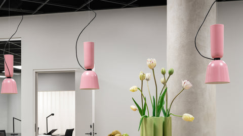An image of 3 Alphabeta Pendant Lights in Pink hanging from the ceiling.