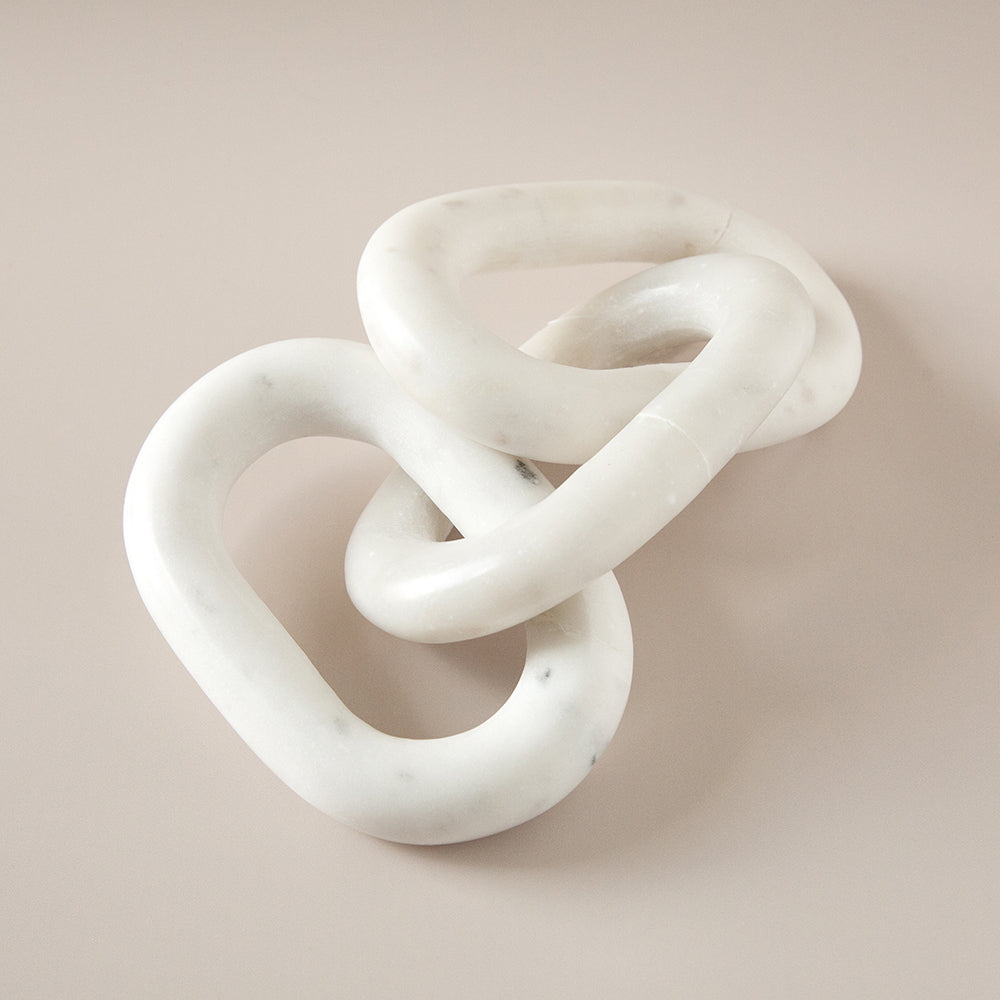 white marble chain link sculpture
