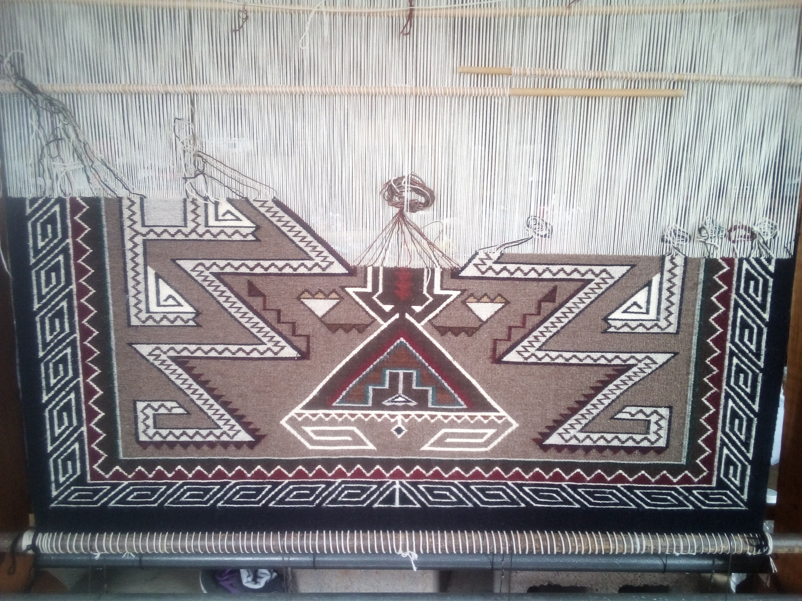 Teec Nos Pos Navajo Rug: Marion Nez :  Looming Attractions