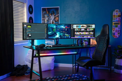 Gaming room setup with 3 monitors