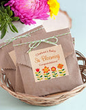 alt="baby shower favour seed bag. Brown paper bag filled with flower seeds and personalised label added"