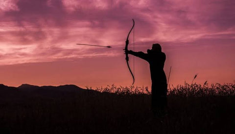 showing how to use recurve bow