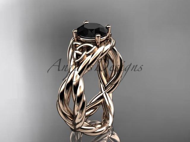 14kt rose gold rope celtic engagement ring with a Black Diamond 