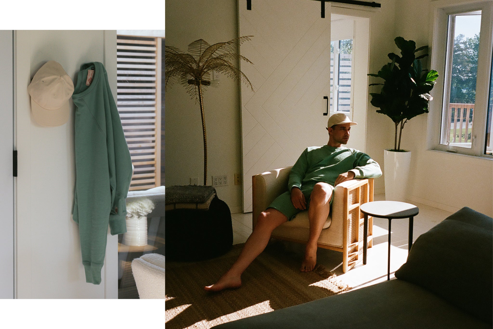 Man sitting indoors in sweatshirt and sweatshorts with sun shining in through window