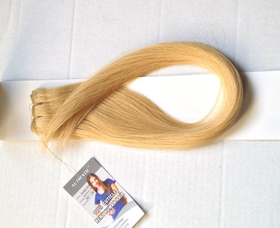 7. "Blonde Human Hair Weft" by Hair Factory - wide 6