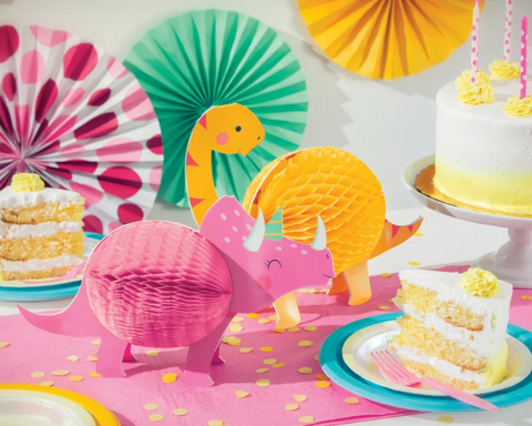 Pink and yellow dinosaur party decorations for girly dinosaur party