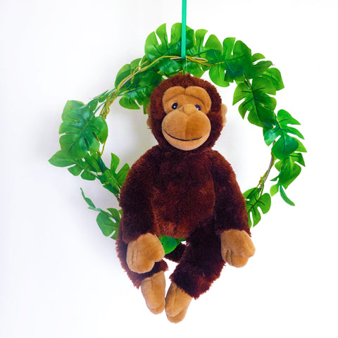 stuffed monkey for monkey birthday party decoration