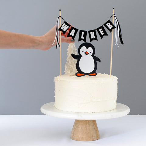 Penguin Cake Topper on white cake with frosted cone to make a winter tree | Cake topper by Avalon Sunshine