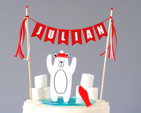 polar bear cake with cake topper and marshmallow snow