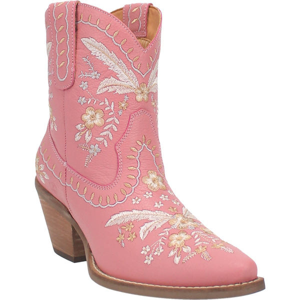 Centered in the picture is a pink cowboy boot with a flower design throughout with a white background. 